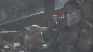 Mandalorian e Grogu em cena da série