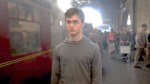 Daniel Radcliffe com Albus Dumbledore John Lithgow